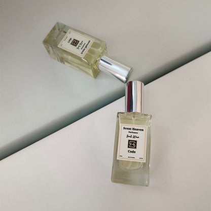 A sleek and masculine bottle of Code Perfume for Men, exuding modern sophistication. The fragrance blends fresh citrus, warm spices, and smooth woody notes, creating a bold and timeless scent. Perfect for the confident man seeking elegance and long-lasting freshness.