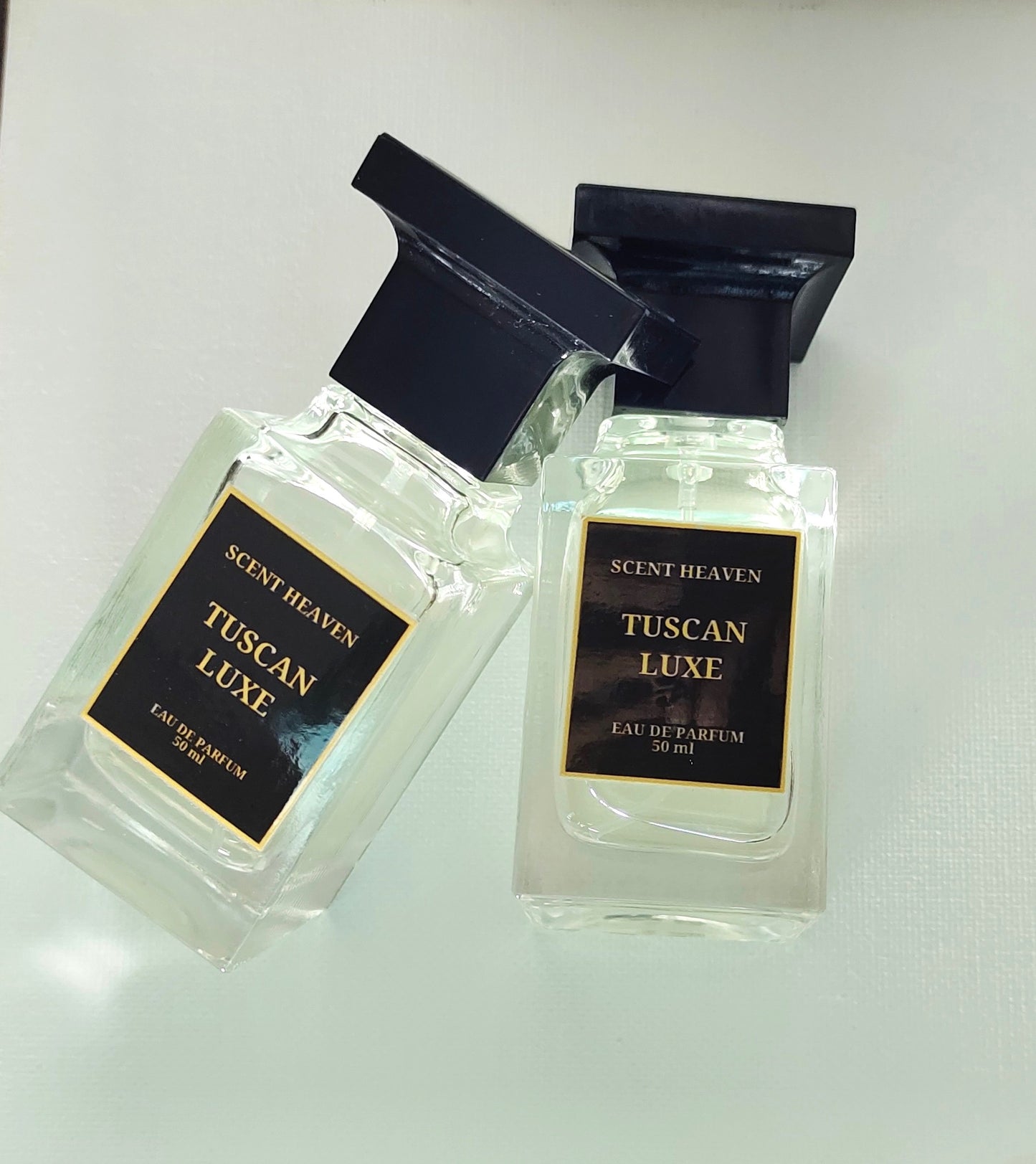 Tuscan Luxe fragrance with smooth leather, warm spices, and sweet raspberry, crafted for a bold and unforgettable unisex scent.